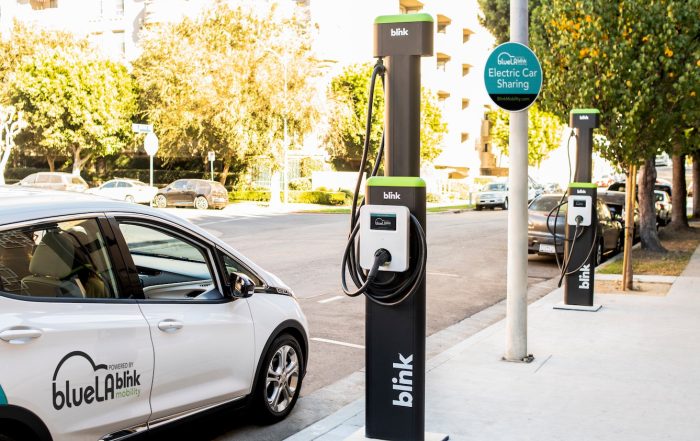 A BlueLA electric vehicle parked at carsharing station